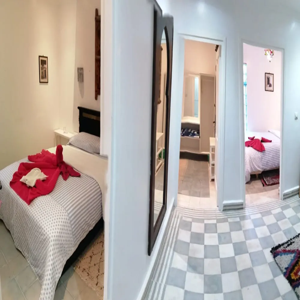 Suite with Moroccan rug and lounge area